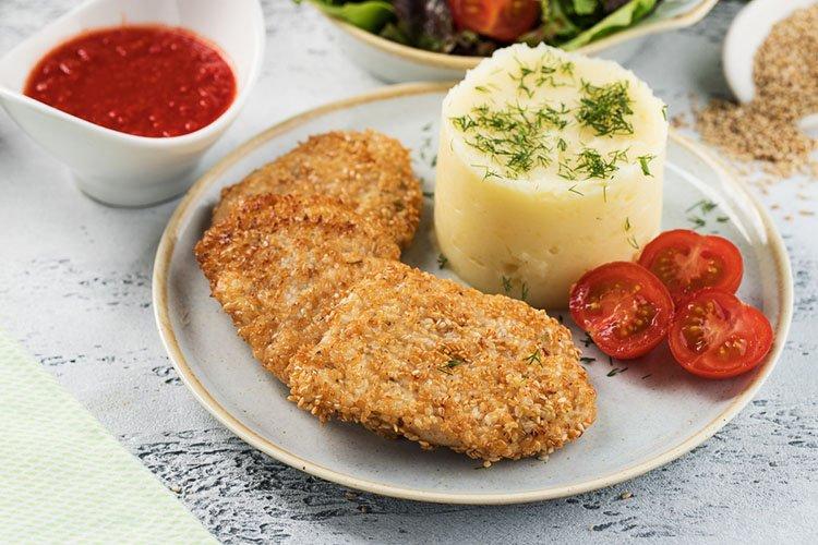 Hähnchenfilet-Schnitzel mit Senf und Honig