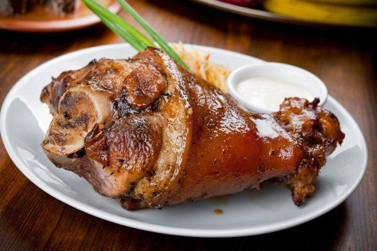 Codillo de cerdo con mandarinas