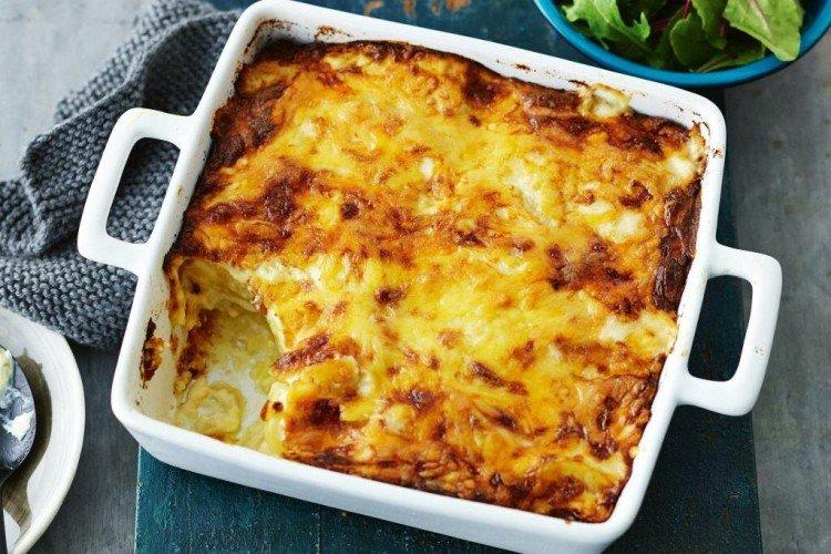 Pork with Potatoes and Cheese in the Oven