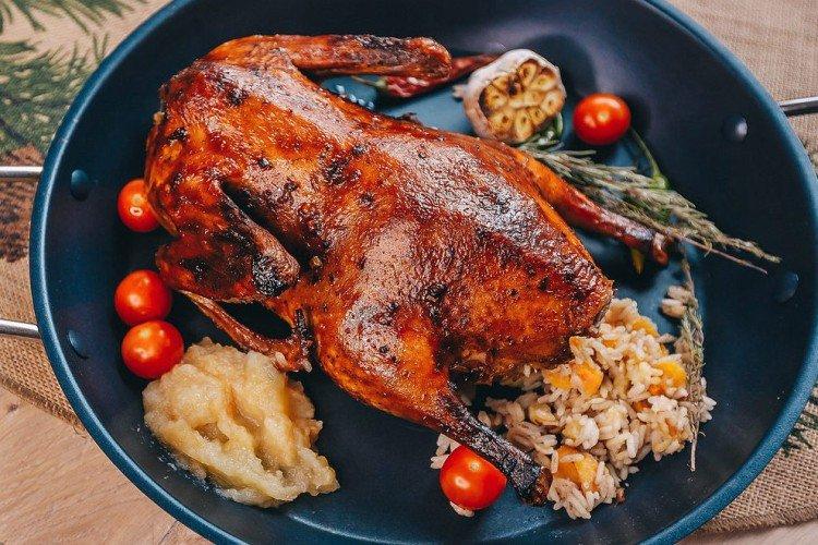 Pato con arroz al horno