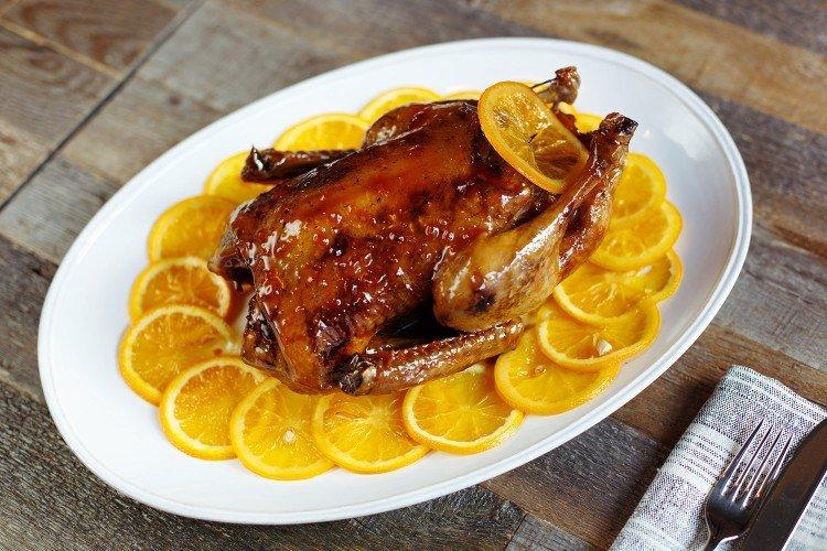 Pato en glaseado de miel y naranja