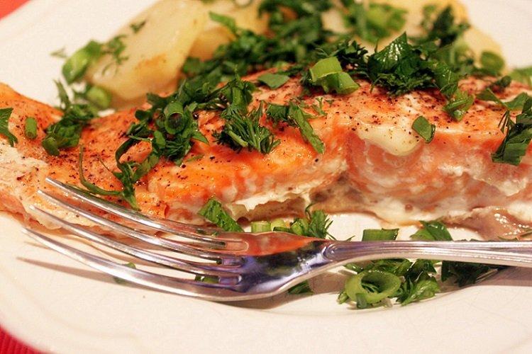 Red Fish on an Onion Bed in the Oven