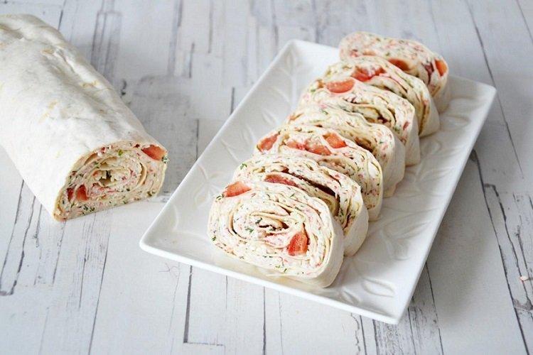 Lachs mit Kräutern und Krabbenstäbchen im Lavash