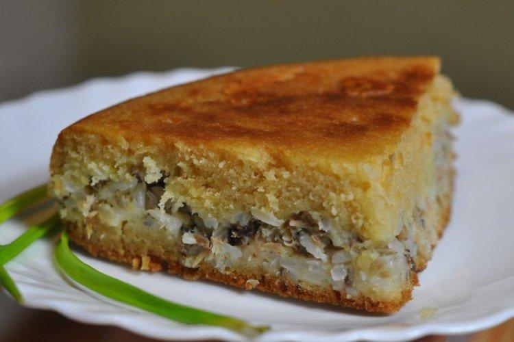 Tarta líquida con arroz y conservas de pescado