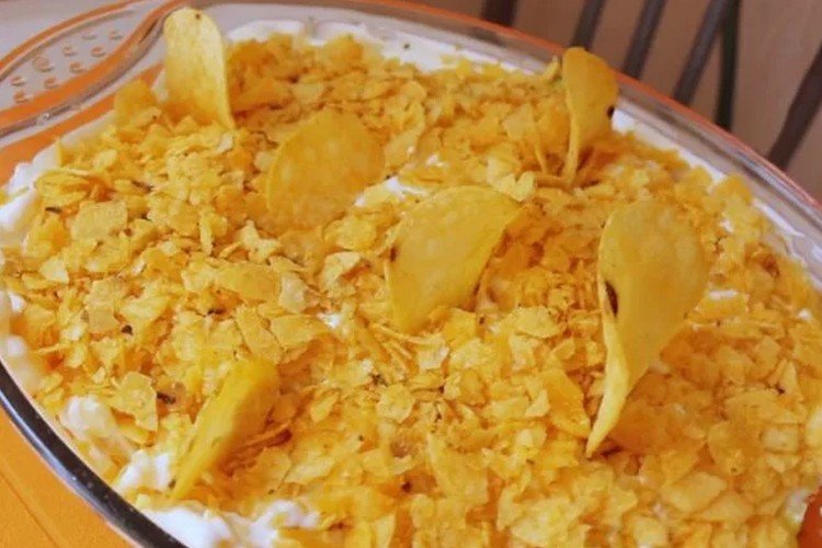 Layered Salad with Chips, Eggs, Avocado, and Canned Pink Salmon