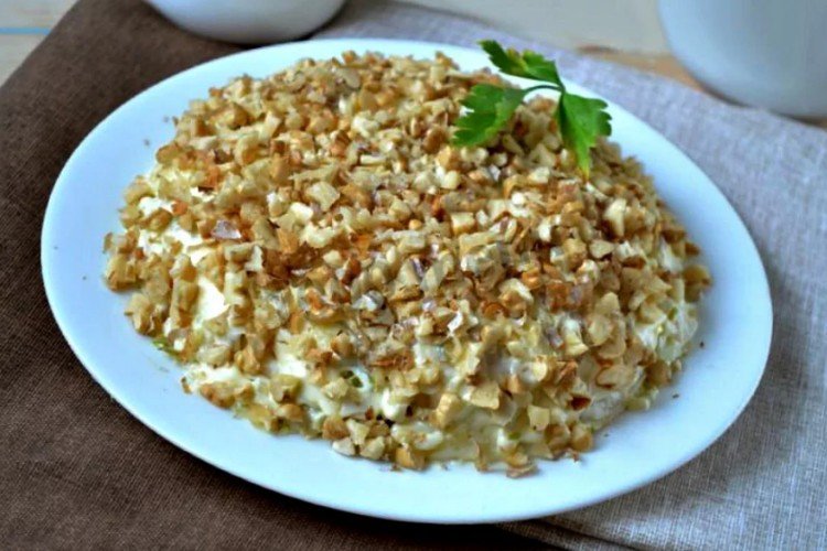 Layered Salad with Canned Pink Salmon, Cheese, Eggs, and Walnuts
