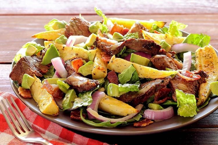 Salad with Fried Potatoes, Beef, Braided Cheese, and Herbs