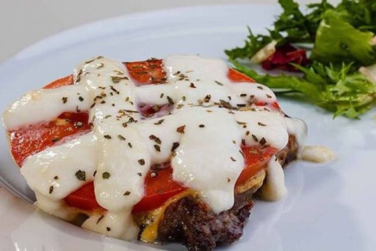 Pork Chops Baked with Mozzarella, Tomatoes, and Basil