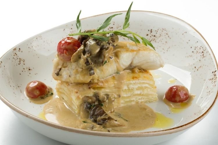Gebratener Fisch mit Pilzen