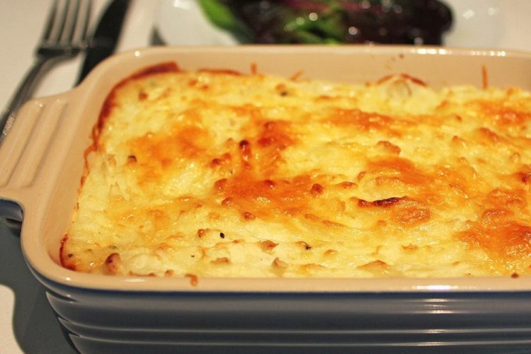 Fish with Potatoes under Cheese