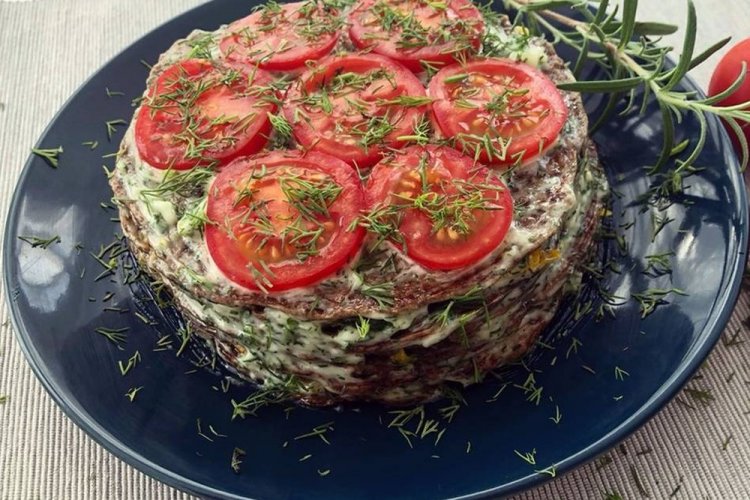 Leberkuchen mit Tomaten