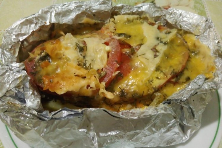 Karpfenstücke unter Käse gebacken