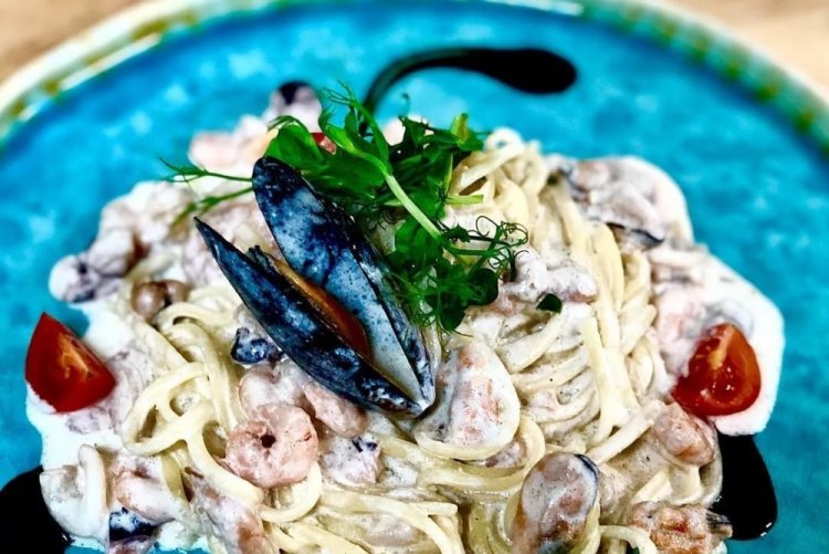 Muscheln mit Garnelen in Sahne-Senf-Sauce