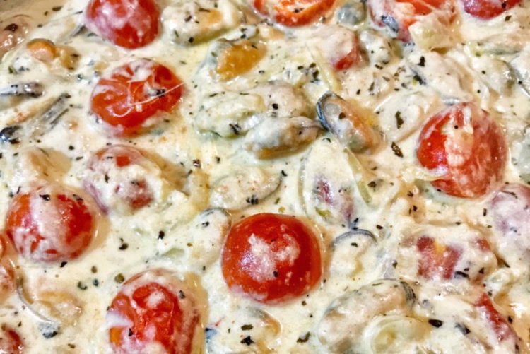Muscheln mit Tomaten in Sahnesauce