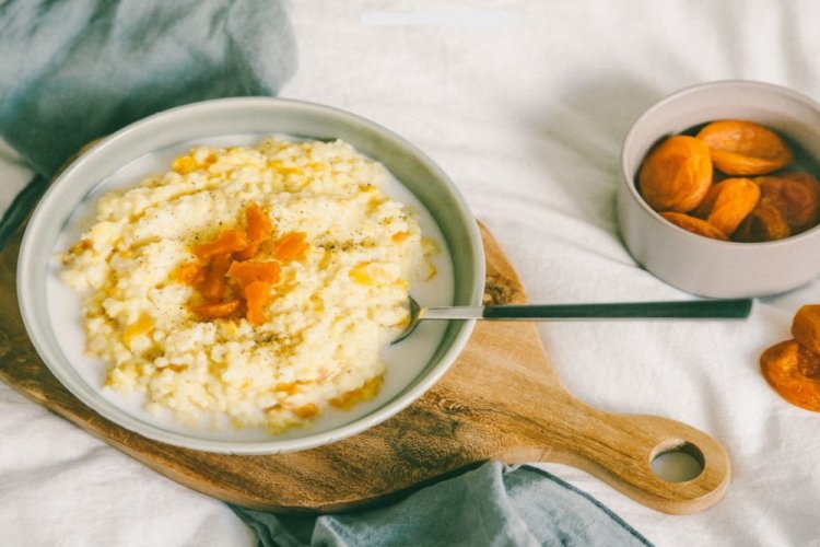 Millet Porridge with Pumpkin and Dried Apricots in Milk