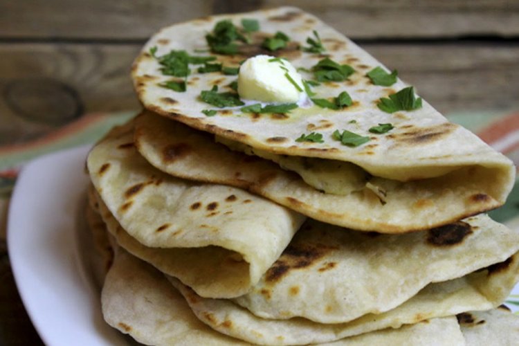 Kystybyi with Potatoes, Adyghe Cheese, and Herbs
