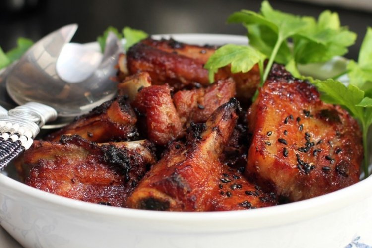 Costillas de cerdo con naranja en bolsa