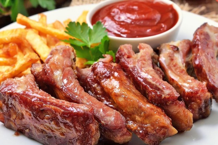 Costillas de cerdo en salsa de soja con zumo de naranja