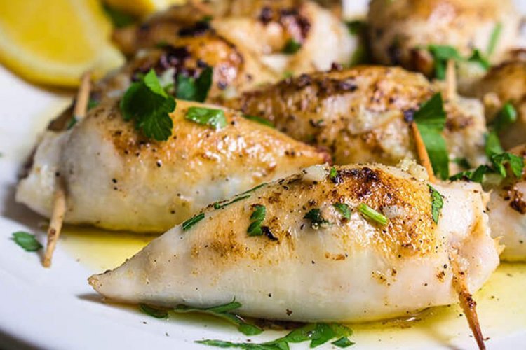 Squid Stuffed with Seafood Cocktail and Rice
