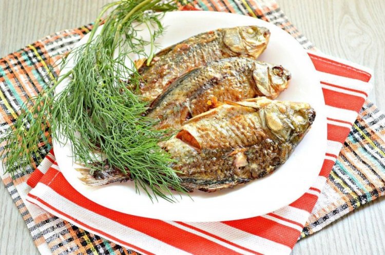 Carpa con champiñones en el horno