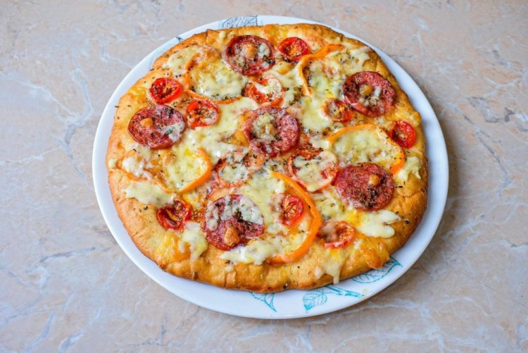 Pizza with Sausage, Tomatoes, and Mozzarella