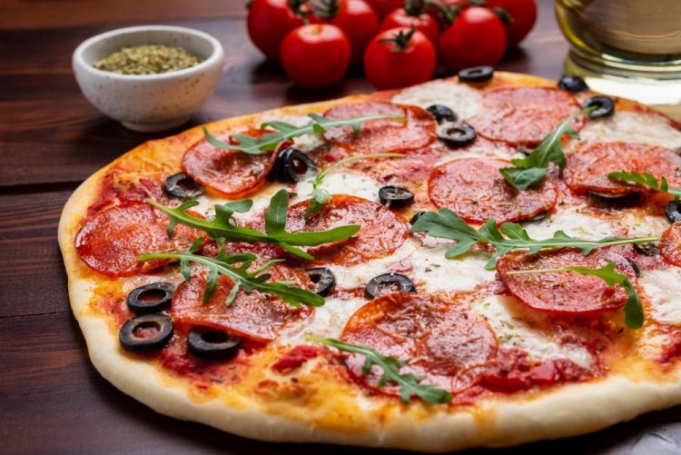 Pizza with Sausage, Mozzarella, and Olives