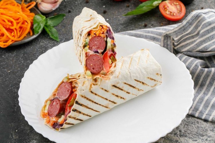 Hot Dog with Sour Cream and Tomato Sauce in Lavash
