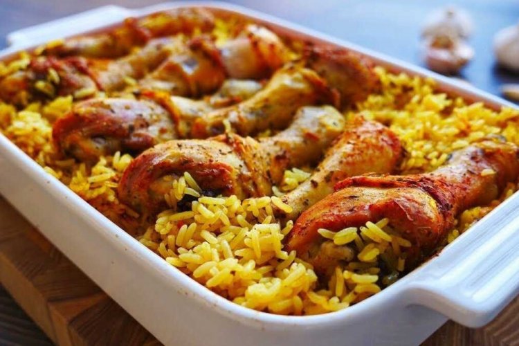 Chicken Drumsticks with Rice and Carrots in the Oven