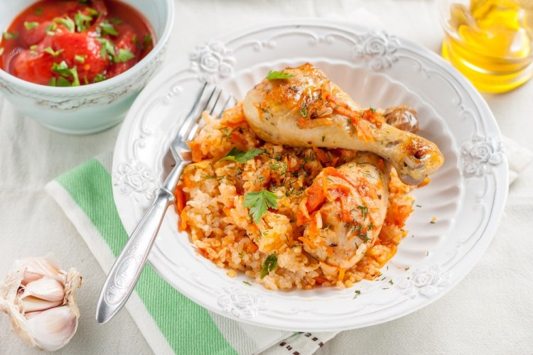 Chicken Drumsticks with Rice and Tomato in the Oven