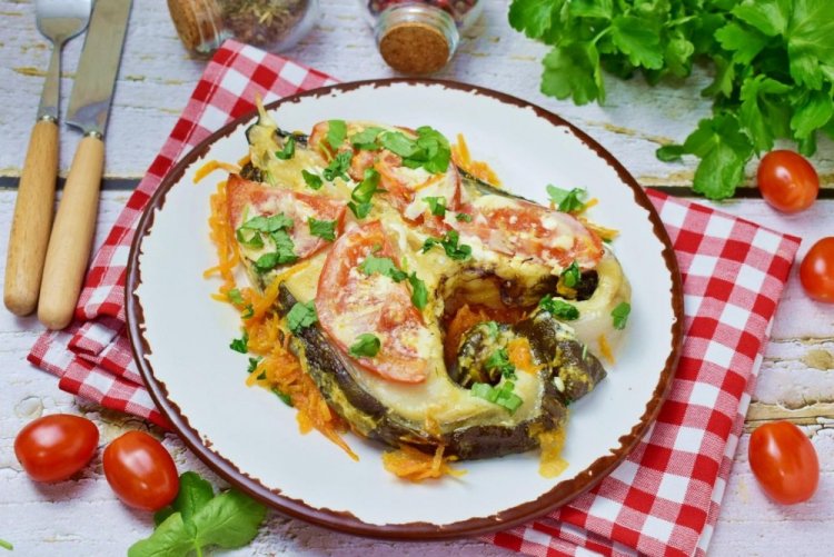 Wolffish Steaks with Tomatoes and Sour Cream in the Oven
