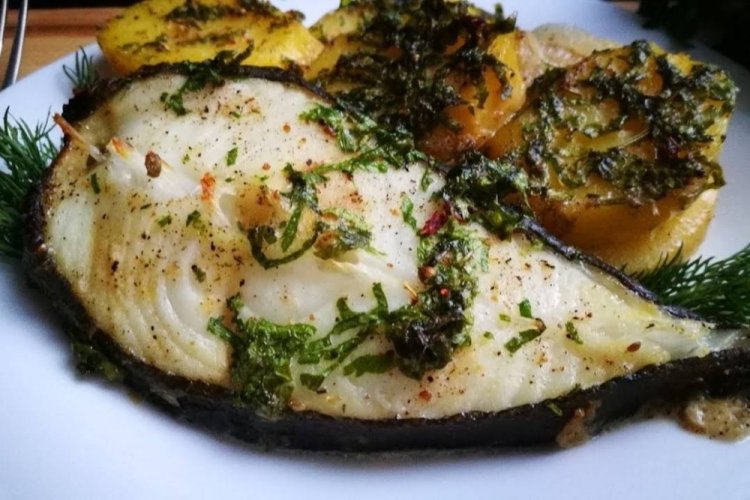 Wolffish Steaks with Chopped Herbs in the Oven