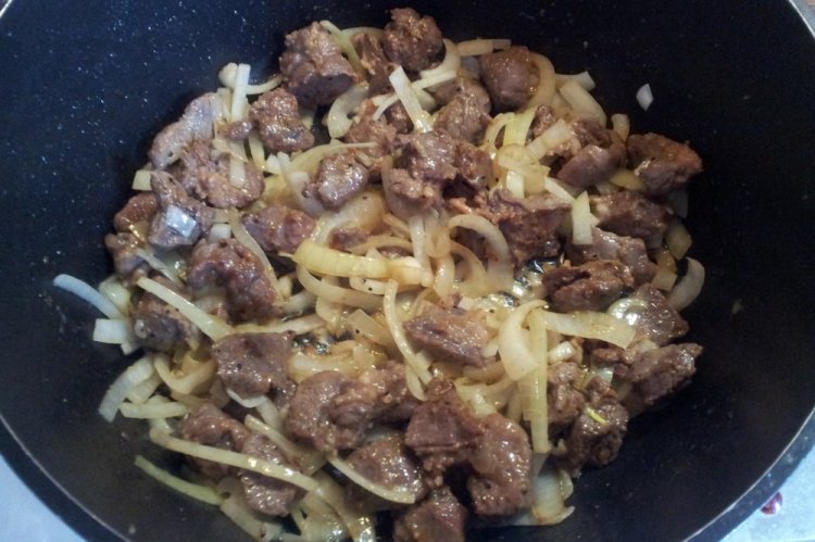 Lamb with Onions in a Skillet