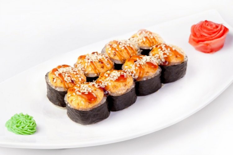 Rolls with Sea Bass and Avocado, Baked with Cheese Topping