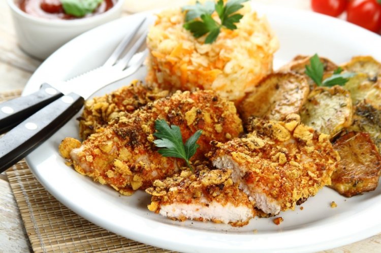 Escalope de pollo empanado con copos de maíz