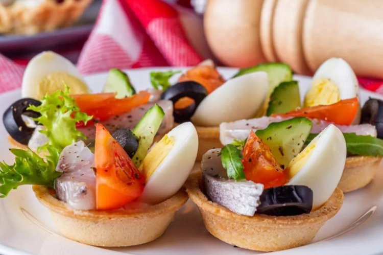 Tartlets with Herring and Quail Eggs