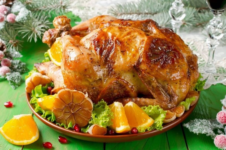 Pollo con naranjas y manzanas