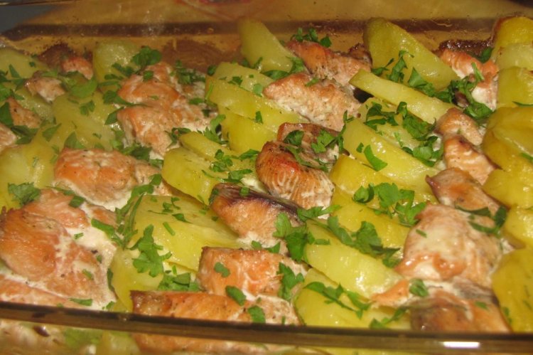Pink Salmon with Potatoes in the Oven for New Year 2024