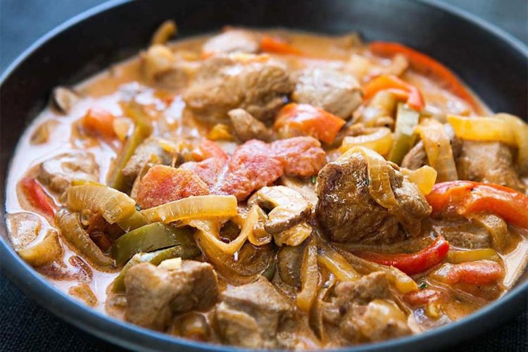 Pork with Vegetables and Mushrooms in a Skillet