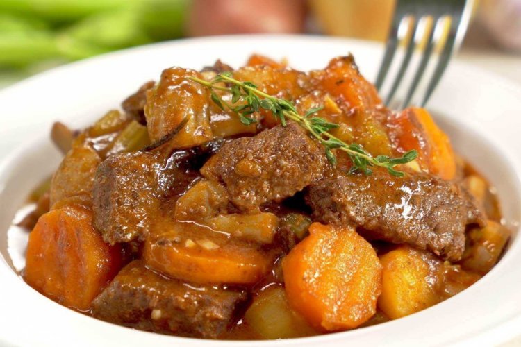 Pork with Vegetables and Potatoes in a Skillet