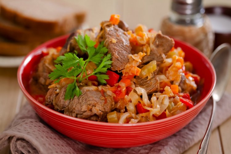 Pork with Vegetables and Cabbage in a Skillet