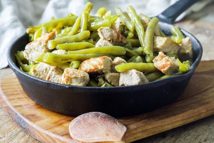 Pork with Green Beans and Onion in a Skillet