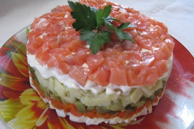 Layered Salad with Potatoes, Cucumbers, and Red Fish