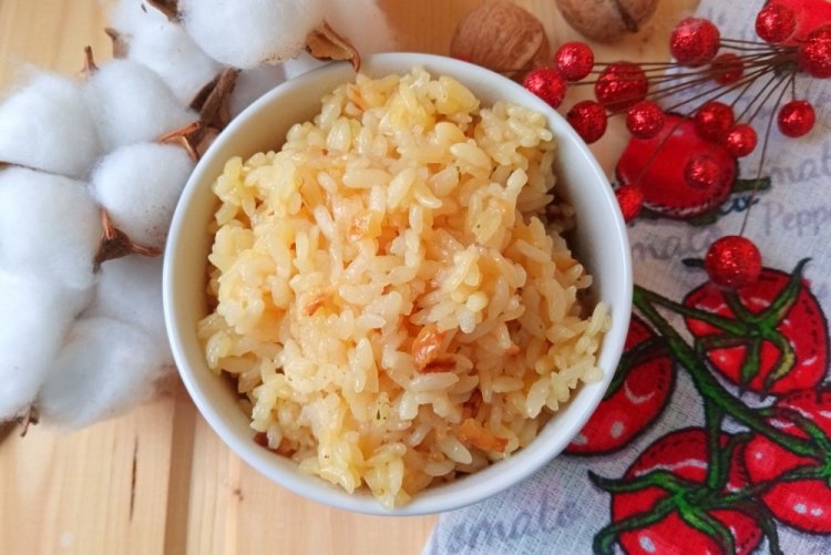 Rice with Onions and Carrots in a Skillet