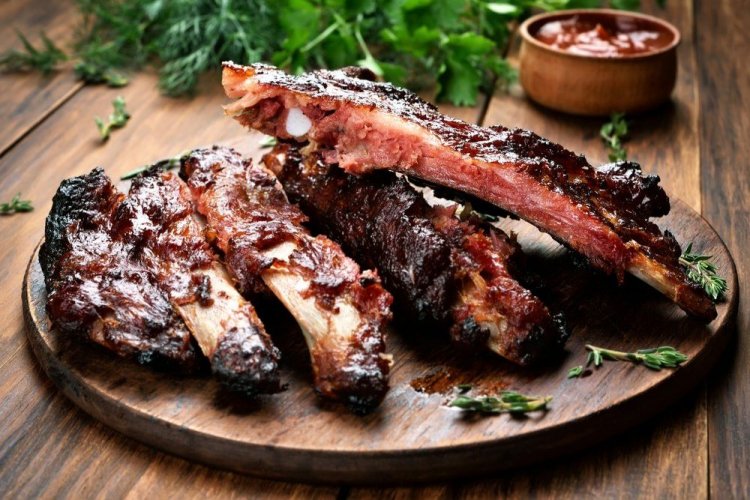 Beef Ribs in BBQ Sauce on the Grill