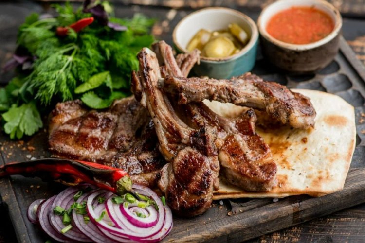 Beef Ribs with Onion and Lemon on the Grill