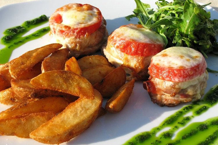 Pork Medallions with Tomatoes and Cheese