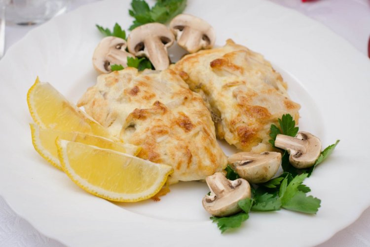 Pollock with Mushrooms in Sour Cream under Cheese