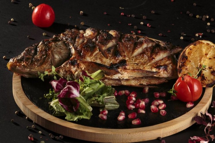 Carp with Pomegranate Sauce on the Grill