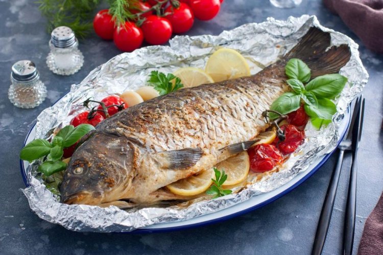 Carp with Lemon, Tomatoes, and Basil in Foil on the Grill