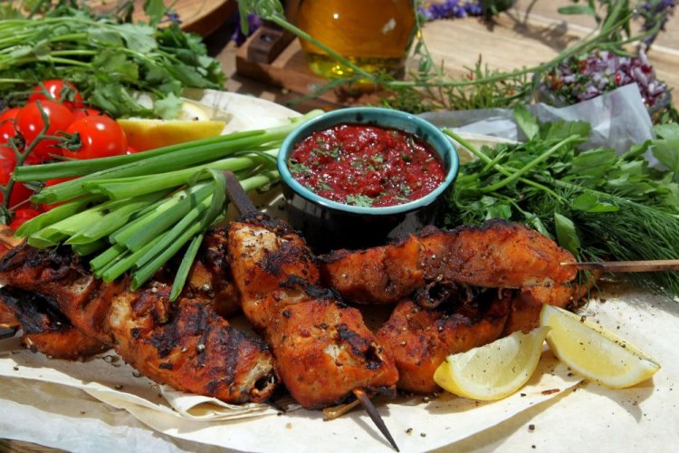 Carp Skewers in Tomato, Adjika, and Onion Marinade